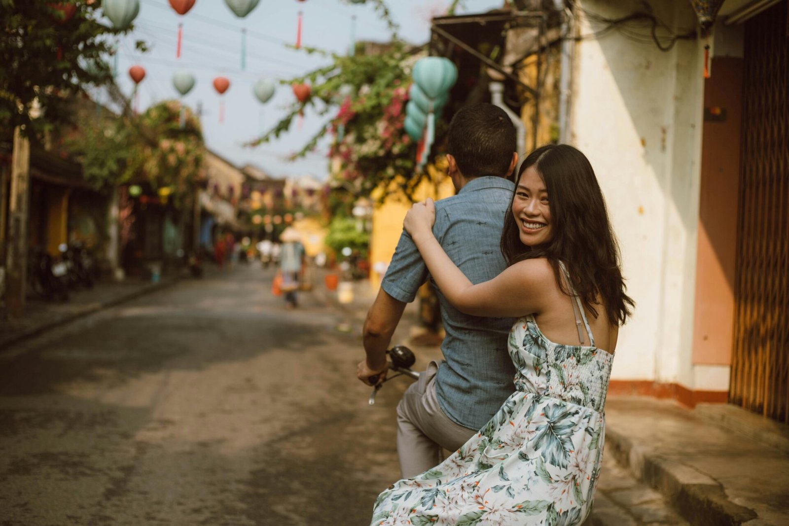 Young couple on a bicycle on holiday