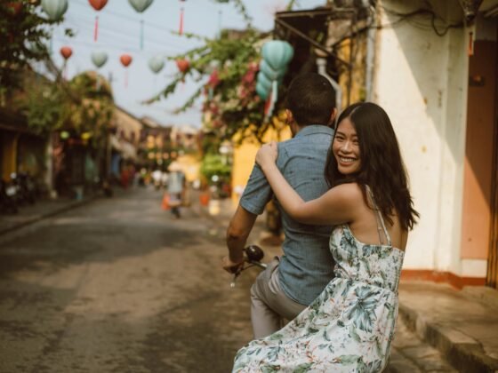 Young couple on a bicycle on holiday