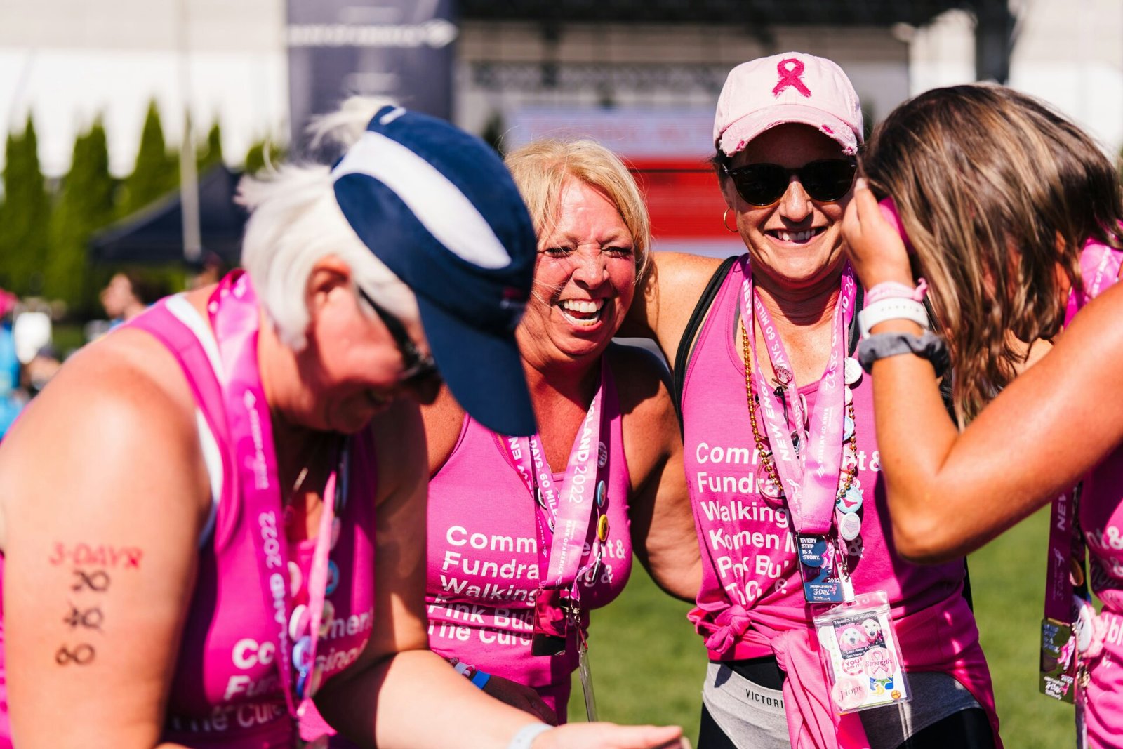 Four women celebrating after completing a fundraising challenge