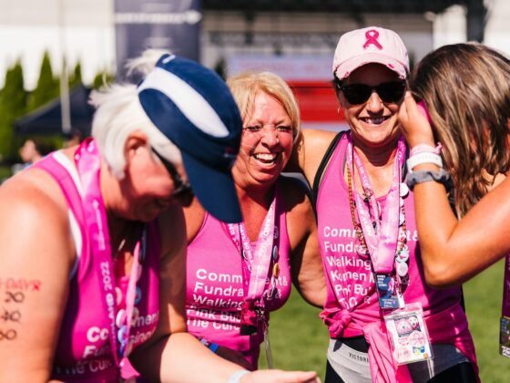 Four women celebrating after completing a fundraising challenge